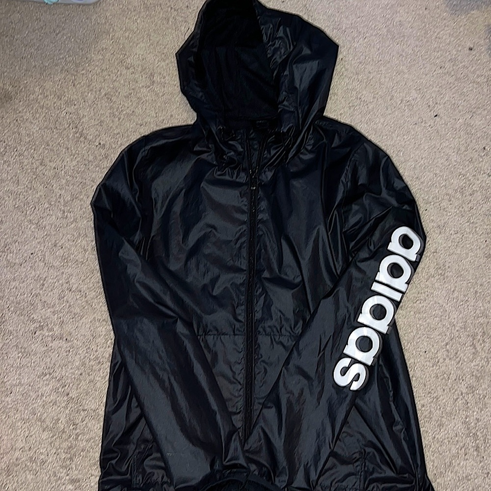 Only worn a couple times for track. It is a windbreaker.